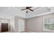 Bedroom with a ceiling fan and carpet at 52 Olivia Ct, Palmetto, GA 30268
