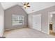 Bedroom with vaulted ceiling, ceiling fan, window, and closet at 52 Olivia Ct, Palmetto, GA 30268