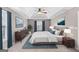 Bedroom features a tray ceiling, ceiling fan, windows and bedroom furniture at 52 Olivia Ct, Palmetto, GA 30268