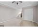 Bedroom with carpet, closet, ceiling fan, and windows with blinds at 52 Olivia Ct, Palmetto, GA 30268
