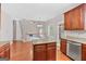Bright eat-in kitchen has an island, granite countertops and stainless steel appliances at 52 Olivia Ct, Palmetto, GA 30268
