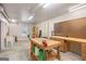 Well-lit workshop with pegboard walls, spacious worktables, and versatile storage options at 52 Olivia Ct, Palmetto, GA 30268