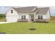 Charming single Gathering home showcasing a well-maintained lawn and welcoming entrance at 280 Oliver Dr, Locust Grove, GA 30248