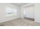 Bright, carpeted living room with large window offering plenty of natural light at 280 Oliver Dr, Locust Grove, GA 30248