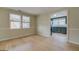 Dining room with light-colored hardwood floors looking into kitchen at 4131 Carroll Sw St, Covington, GA 30014