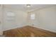 Bedroom features natural light, wood floors, and neutral wall color at 734 Meadowlark Dr, Villa Rica, GA 30180