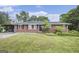 Charming single-story brick home featuring a well-maintained lawn and a cozy, inviting facade at 734 Meadowlark Dr, Villa Rica, GA 30180