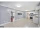 Spacious kitchen featuring ceramic tile floors, open layout, and access to multiple rooms at 734 Meadowlark Dr, Villa Rica, GA 30180