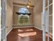 Bedroom featuring a large window with natural light and a ceiling fan at 111 Kenton Pl, Peachtree City, GA 30269