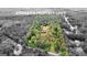 An aerial perspective reveals the property's perimeter, set within a lush and verdant environment at 8129 S Giles Rd, Douglasville, GA 30135