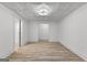 Basement area featuring wood-look flooring and a closet at 8129 S Giles Rd, Douglasville, GA 30135