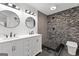 Modern bathroom featuring a double vanity, walk-in shower and tiled accents at 8129 S Giles Rd, Douglasville, GA 30135