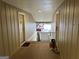 Exterior hallway with multiple unit entrances, offering access and showing building layout at 5147 Roswell Rd # 47, Atlanta, GA 30342