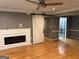 Living room with hardwood floors, a fireplace, and a stylish barn door at 5147 Roswell Rd # 47, Atlanta, GA 30342