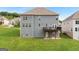 Spacious backyard with a wooden deck offering room for outdoor activities and relaxation at 3692 Wartrace Dr, South Fulton, GA 30331