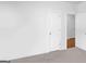 Spacious bedroom featuring neutral carpet and views to a secondary room or bathroom at 3692 Wartrace Dr, South Fulton, GA 30331