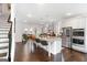 Bright eat-in kitchen boasts stainless steel appliances, and an island with barstool seating at 3692 Wartrace Dr, South Fulton, GA 30331