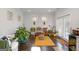 Cozy living room featuring wood floors, natural light, and decorative plants, creating a welcoming atmosphere at 3692 Wartrace Dr, South Fulton, GA 30331