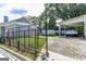 Fenced backyard with driveway, and car parked in carport at 1091 Selwin Sw Ave, Atlanta, GA 30310