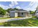 Charming home with a brick and siding exterior, complemented by a well-maintained lawn at 1091 Selwin Sw Ave, Atlanta, GA 30310