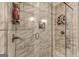 Modern shower featuring gorgeous tile work and a built-in niche for storage at 1091 Selwin Sw Ave, Atlanta, GA 30310