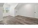 Bright attic room with modern flooring, sloped ceilings, and a window for natural light at 4186 Matisse Ln, Fairburn, GA 30213