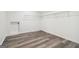 Walk-in closet with modern flooring and ample storage space at 4186 Matisse Ln, Fairburn, GA 30213