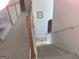The carpeted hallway features white banisters and wood railings at 6570 Laurens Way, Stone Mountain, GA 30087