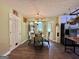 Cozy dining area with hardwood floors, stylish chandelier, and seating for four at 150 Willow Shoals Dr, Covington, GA 30016
