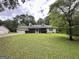 Traditional home with large yard, attached garage, and classic curb appeal at 150 Willow Shoals Dr, Covington, GA 30016