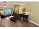 Bright living room with hardwood floors, comfortable seating, and natural light at 150 Willow Shoals Dr, Covington, GA 30016