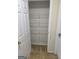 Functional closet with wire shelving for organization and storage, set within a neutral-toned space at 1925 Cedar Walk Ln, Conley, GA 30288