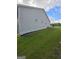 Exterior view of house with green grass yard at 1925 Cedar Walk Ln, Conley, GA 30288