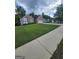 A charming single-Gathering home with a well-manicured lawn and a spacious driveway at 1925 Cedar Walk Ln, Conley, GA 30288