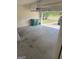 Empty garage with green trash bins at 1925 Cedar Walk Ln, Conley, GA 30288
