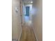 Hallway with carpet floor that leads to the rooms at 1925 Cedar Walk Ln, Conley, GA 30288