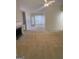 Open living room with a fireplace and carpet flooring at 1925 Cedar Walk Ln, Conley, GA 30288