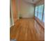 Bright living area with wood floors and bay windows at 1925 Cedar Walk Ln, Conley, GA 30288