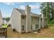 Home exterior showcases backyard and landscaping at 7813 Newbury Dr, Jonesboro, GA 30236