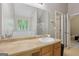 Bathroom vanity with lots of countertop space and a large mirror offering a luxurious experience at 7813 Newbury Dr, Jonesboro, GA 30236