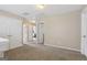 Neutral bonus room with carpet and multiple doors leading to other rooms at 7813 Newbury Dr, Jonesboro, GA 30236