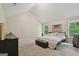 Bedroom with carpet, vaulted ceiling, picture and natural light at 7813 Newbury Dr, Jonesboro, GA 30236