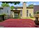 Backyard with deck, chimney, and pergola over a sliding glass door at 984 Wenham Ln, Lawrenceville, GA 30044