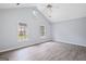 Spacious bedroom offers multiple windows, vaulted ceilings, and ceiling fan at 984 Wenham Ln, Lawrenceville, GA 30044