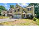 Charming two-story home with an attached two car garage and established neighborhood at 984 Wenham Ln, Lawrenceville, GA 30044
