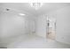 Open living room with porcelain tile floors and modern finishes at 984 Wenham Ln, Lawrenceville, GA 30044