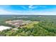 An aerial view displays the property's surroundings with a school and baseball field at 30 Mary Ella Dr, Carrollton, GA 30116