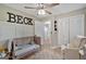 Charming bedroom with decor, window, and light-colored carpet at 30 Mary Ella Dr, Carrollton, GA 30116