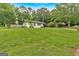 Charming, renovated brick ranch on a lush lot with a carport and spacious front and side yards at 30 Mary Ella Dr, Carrollton, GA 30116