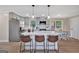 Stylish kitchen with white countertops, pendant lighting and stainless appliances at 30 Mary Ella Dr, Carrollton, GA 30116